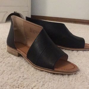 Never been worn black sandals flats.